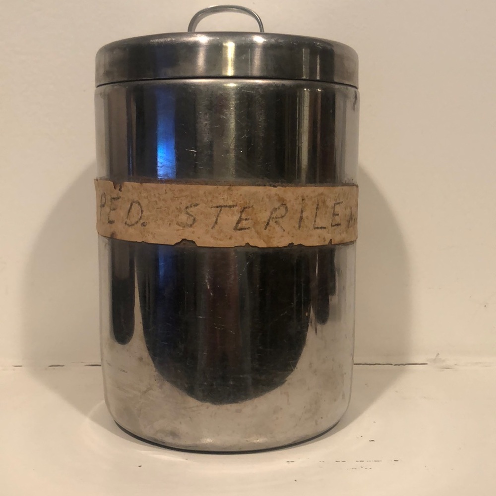 Antique metal container w/ lid
